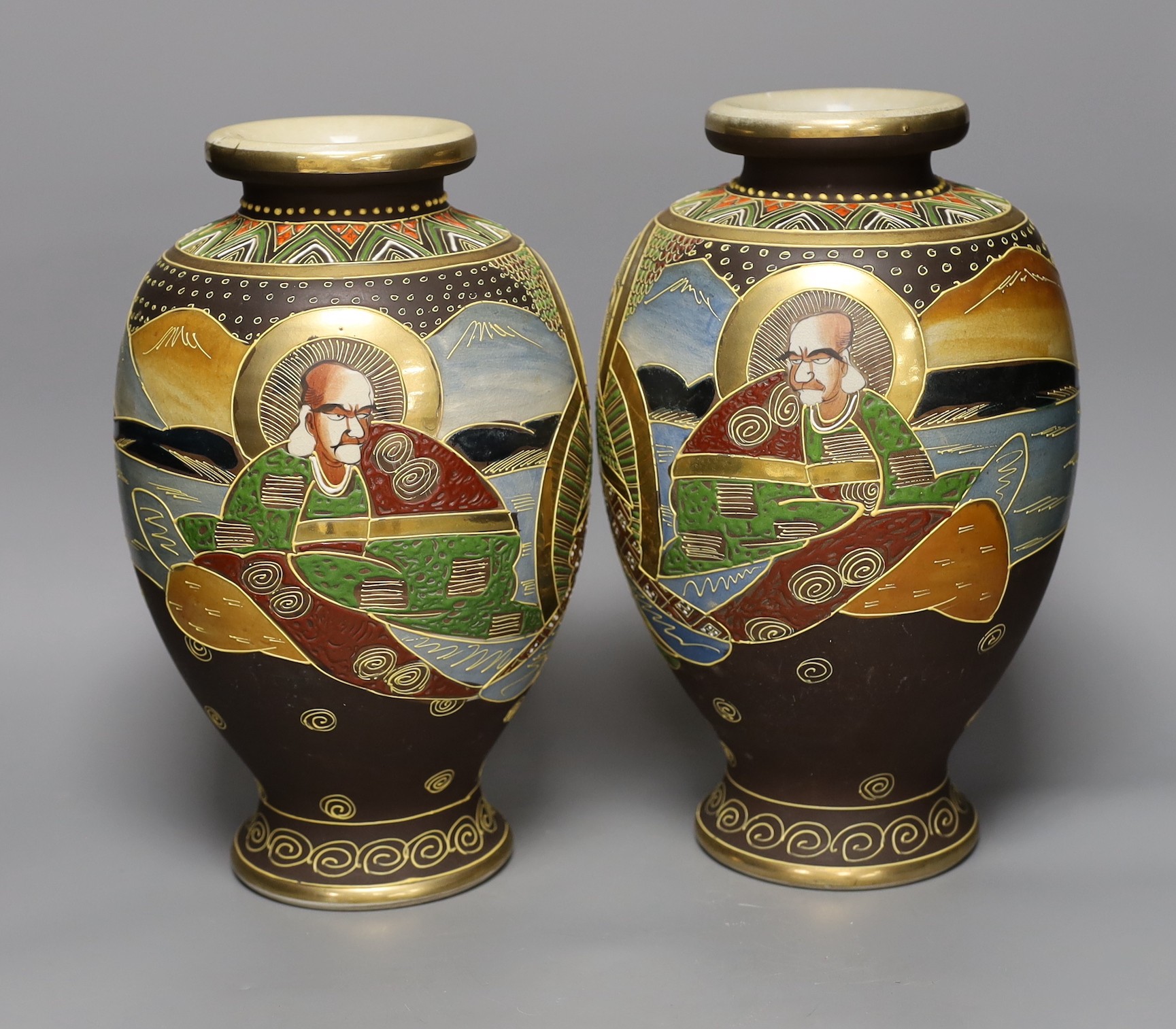 A pair of Satsuma vases, 31cm tall